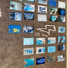 a bulletin board covered in blue and white magnets