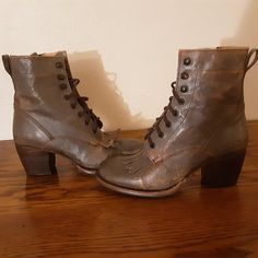 Bed Stu Leather Finis Boots In Smoke Grey Lux, Size 8.5. New In Box With Tags. Never Been Worn, Only Tried On. Some Curling Of Kilt Fringe. Finis Is The Same As Bed Stu's Judgement Style, With A Removable Fringe Kilt At The Base Of The Tongue And Laces. Bought These Before I Figured Out My Bed Stu Size. Turns Out I'm A Size 9, So I Ended Up Getting Another Pair Next Size Up. Smoke Free, Dog Free Home. I Do Have Cats, But They Are Not Allowed In The Room Where These Are Stored. Measurements Lengt Rustic Almond Toe Boots, Brown Moto Boots With Stacked Heel And Round Toe, Brown Moto Boots With Stacked Heel, Vintage Lace-up Boots With Reinforced Heel, Brown Western Ankle Boot Heels, Western Brown Ankle Boot Heels, Western Style Brown Ankle Boot Heels, Fitted Brown Lace-up Boots With Closed Toe, Rugged Heeled Boots With Reinforced Heel