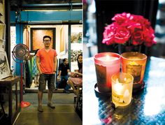 a man standing next to a table with candles on it