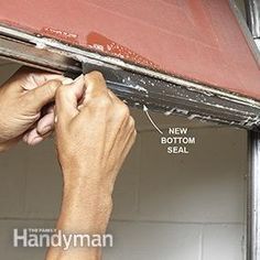 a man is working on the side of a garage door with an opening and seal