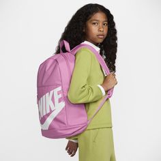 Whether it's rushing to class or hanging out after school with friends, this backpack has the space to tackle it all. This bag features a large side pocket for water bottles as well as a front pocket to store quick-grab items. Adjustable padded straps make wearing this bag comfortable and easy. Amp House, Best Backpacks For School, Backpacks For Kids, Mochila Nike, Large Pencil Case, Nike Backpack, Stylish School Bags, Kid Lifestyle, Pink Nikes