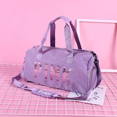 This 20-inch duffle bag is perfect for a weekend getaway or an overnight excursion. Lots of storage with super fun colors. Travel Bag Women, Stylish Travel Bag, Purple Backpack, Training Bags, Sports Bags Gym, Workout Bags, Travel Bags For Women, Shoe Bags, Travel Duffle