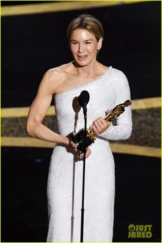 the actress accepts an award for her role in the film's production, which is being presented at the oscars