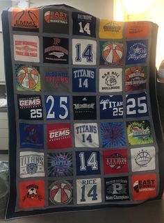 a blanket made to look like the basketball team's jersey is displayed on a table