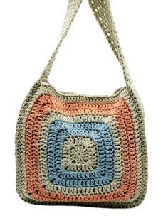 a crocheted handbag with an orange and blue square