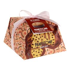 an open box of panettoone cookies on a white background