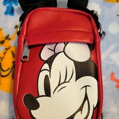 Awesome Disney Minnie Mouse Crossbody Bag. It Has A Large Zipper Compartment And A Small Zipper Compartment On The Front And A Adjustable Strap. Great For Everyday Use Or For Travel. Red Disney Bag With Zipper Closure, Cute Red Bag For Disney Trips, Red Mickey Mouse Backpack, Trendy Red Bags For Disney Trips, Disney Crossbody Bags For Disney Trips, Disney Style Crossbody Bags For Disney Trips, Red Minnie Mouse Bag For Disney Fan Events, Disney Minnie Mouse Red Bags, Red Mickey Mouse Casual Bag