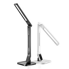 a desk lamp that is on top of a white surface with the light turned off