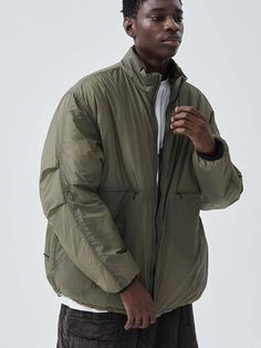 Editor's notesIt's made of high-density, lightweight lip-stop nylon. Light and soft-fitting nylon material is used inside. There is a pocket detail in the middle of the front that can be opened and closed with the console zipper. Two pleats from the military detail are added to the sleeve to add activity, and the tip of the sleeve is banded.- Adjustable string on hem- 2way zipper closure- Water repellency - Semi-oversized fit- Daily itemMeasurements(in.)Size: 1 / 2 / 3- Total length:&n Urban Nylon Puffer Jacket With Zipper Closure, Khaki Nylon Puffer Outerwear, Recycled Polyester Long Sleeve Outerwear With Pockets, Long Sleeve Outerwear With Pockets In Recycled Polyester, Nylon Techwear Puffer Jacket, Solid Nylon Techwear Puffer Jacket, Windproof Recycled Polyester Outerwear For Streetwear, Khaki Nylon Outerwear With Zipper, Khaki Nylon Outerwear With Zipper Closure