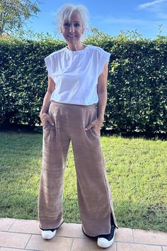 Effortlessly elevate your everyday look with the Made in Italy Nancy Trim Trousers. These casual trousers feature an elasticated waistband, convenient pockets, and chic trim detailing. Perfect for any occasion, these trousers are sure to become a staple in your wardrobe. -Elasticated waistband -Pockets -Contrasting trim -Split in hemline Contrasting Trim, Casual Trousers, Jeans Jumpsuit, Dungarees, Vest Dress, Tunic Dress, Everyday Look, Camel, Shopping Outfit