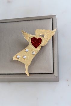 Vintage Newpro Angel with Red Heart Brooch. Length: 2 3/8" Width: 1 1/2" Vintage condition! Back to the shop: https://www.etsy.com/shop/SusVintage?ref=hdr_shop_menu Don't hesitate to contact me if you have any further questions. Thank you! Vintage Red Lapel Pin For Gift, Vintage Red Lapel Pin As Gift, Red Vintage Lapel Pin For Gift, Red Vintage Lapel Pin As Gift, Heart-shaped Brooch For Valentine's Day Anniversary, Heart-shaped Brooches For Valentine's Day Anniversary, Heart-shaped Brooch For Anniversary On Valentine's Day, Red Brooch Pins For Valentine's Day, Valentine's Day Gift Brooch Pins