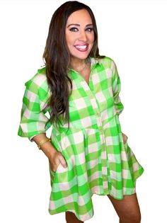 Plaid collared button up 3.4 sleeve mini dress featuring pockets at side. Unlined. Woven. Final Sale Green Shirt Dress With Pockets For Day Out, Collared Mini Dress For Daywear In Spring, Green Collared Shirt Dress For Work, Spring Day Out Collared Dress, Collared Spring Dresses For A Day Out, Long Sleeve Mini Dress With Pockets For Day Out, Collared Dresses For Spring Day Out, Fall Collared Mini Dress With Pockets, Collared Mini Dress With Pockets For Fall