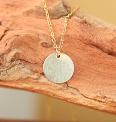 Gold disc necklace - gold dot - gold circle necklace - simple - everyday necklace - a 14k gold filled disc on a 14k gold vermeil chain A simple and classy, ultra feminine 14k gold filled disc hanging from a 16 inch 14k vermeil chain. Please feel free to select a different length chain if you prefer! ♥ Handmade with love in sunny California ♥ This gem will arrive happily in a gift pouch or box More from BubuRuby? https://www.etsy.com/shop/BubuRuby?ref=hdr_shop_menu Looking for other charm necklac Gold Disc Necklace, Gold Circle Necklace, Gold Disc, Gold Dots, Everyday Necklace, Disc Necklace, Circle Necklace, Simple Necklace, Gold Vermeil