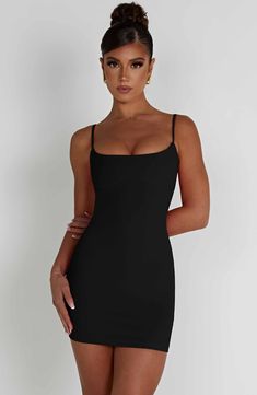 Simple and chic in design, the Estee mini is cut from our stretch crepe fabric in a classic black hue and fits close to the body. It features barely there straps and sculpted bust with a low neckline. Wear yours with mules and sleek hair. 



Colour: Black.

Premium stretch crepe.

Body hugging.

Sculpted bust.

Barely there straps.

Mini length.

Model is an XS and is wearing an XS.

 Size: XS, S, M, L, XL, XXL Homecoming Dresses Corset, Midi Dress Wedding Guest, Sleek Hair, Colors Dress, Gisele Bündchen, Maxi Dress Sale, Low Neckline, Dress Boots, Sparkle Dress