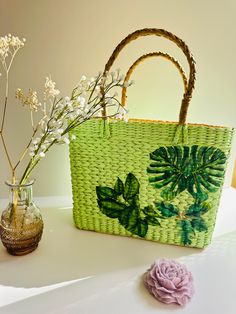 Size:  - Length : 11inchs  - Height : 11 Inchs Features: - Material: Handwoven Seagrass - Artisans Made - These bags are handmade by the artisans of North East India who weave premium quality Seagrass - Sustainable - This bag is not only elegant but also an eco-friendly alternative to plastic. Water Reed products are completely natural, biodegradable, and eco-friendly - Size: Large, spacious interior - Usage: Perfect for beach, shopping, or casual outings - Style: Boho, Summer, Casual - Durabili Green Square Beach Shoulder Bag, Green Square Shoulder Bag For Beach, Green Handheld Beach Bag, Green Square Shoulder Bag For The Beach, Green Handheld Shoulder Bag For Vacation, Handheld Green Beach Bag, Green Square Shoulder Bag For Vacation, Summer Green Square Shoulder Bag, Green Square Beach Bag For Vacation