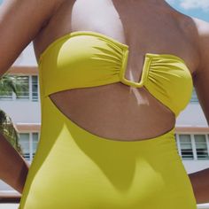 Strapless Swimsuit. Straight Neckline. Lined Metal Piece And Opening Chest. Outer Shell 84% Nylon, 16% Elastane. Lining 91% Nylon, 9% Elastane. Color Yellow . Size: Small Chic Yellow Stretch Swimwear, Chic Zara Swimwear For Vacation, Chic Zara Swimwear, Fitted Cutout One Piece, Chic Stretch Swimwear By Zara, Zara One-piece Swimwear For Pool, Zara Stretch Swimwear For Pool, Zara One-piece Swimwear For Vacation, Chic Lined Zara Swimwear