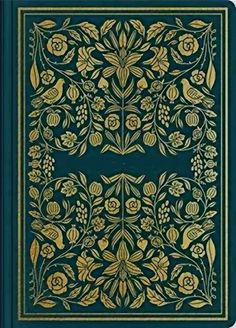 an old book with gold trimmings and floral designs on the cover, in blue