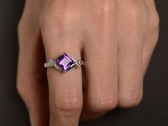 Welcome to my shop, you can find many beautiful gemstone jewelry here, and you also can ask for customized service. Main Stone: amethyst, square cut, measures 7X7mm, 1.62 carats Accent Stones: cz Metal: 925 sterling silver plated with rhodium. I also can provide metal options such as 14k solid yellow/white/rose gold Setting: four claw basket setting more rings: https://www.etsy.com/shop/XCjewelryStudio?ref=hdr_shop_menu It's a perfect gift for the person who was born in February (Birthstone), it Purple Square Cut Jewelry For Gifts, Purple Amethyst Ring With Accent Stones, Rectangular Shape, Rectangular Purple Amethyst Ring With Accent Stones, Rectangular Purple Amethyst Ring For Anniversary, Diamond Cut Amethyst Ring As A Gift, Rectangular Purple Amethyst Wedding Ring, Square Cut Amethyst Ring For Anniversary, Anniversary Square Cut Amethyst Ring, Amethyst Ring Silver