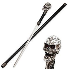 two black and white chopsticks with a skull on it next to an object