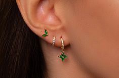 ✨Emerald Gold- Plated Silver Hoop Earring Set. This Stacking Earring Set is perfect for everyday wear, or a beautiful gift for a special lady! :) ✨Product specifications:  * Material: Sterling silver with Zircon  * Hoops Diameter (inner): 7mm.  * Hoops width: 2mm. *Stud:4mm. ✨✨FREE PERSONALISED GIFT POUCH WITH EVERY ORDER Select a gift pouch colour (lilac or cream - refer to the last photo for guidance) and make it your own by adding up to 10 letters or numbers as a personal touch. I will gladly include a gift message. ✨Shipping:  * All orders will be shipped out within 1 business day after receiving the order.  *UK delivery aim: 1-2 working days *Europe delivery aim: 3-5 working days  *Worldwide delivery aim: 5-7 working days  (weekends excluded) ✨Care instructions: * Avoid contact with p Green And Silver Earring Stack, Green Earring Stack, Green Dangle Hoop Earrings, Earring Stacks Silver, Piercing Stacking, Hoop Earring Stack, Hoop Earring Set, Earring Stack, Gold Hoop Earring