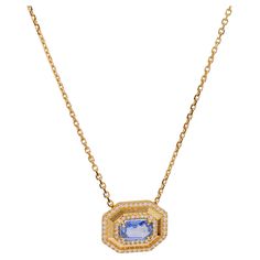 One 0.99 Carat Sapphire and Diamond 18k Yellow Gold Pendant Necklace. Featuring one octagonal step cut sapphire of 0.99 carat. Accented by 62 round brilliant cut diamonds with a total weight of 0.20 carat, graded near-colorless, SI clarity. Crafted in 18 karat yellow gold with purity marks. Circa 2023. The necklace is 20 ½ inches in length and may be resized. About this Item: Elevate your elegance with our sapphire and diamond pendant necklace, a mesmerizing blend of sophistication and timeless beauty. Centered around a brilliant octagonal step cut sapphire of just under a carat, this pendant exudes a captivating deep blue allure. Accentuating its splendor, pave diamonds with a total weight of 0.20 carat, encircle the sapphire, adding a touch of sparkle to the piece. The pendant is masterf Step Cut, Crown Jewels, Yellow Gold Pendants, Diamond Pendant Necklace, Gold Pendant Necklace, Sapphire Diamond, Round Brilliant Cut Diamond, Pave Diamonds, Diamond Pendant