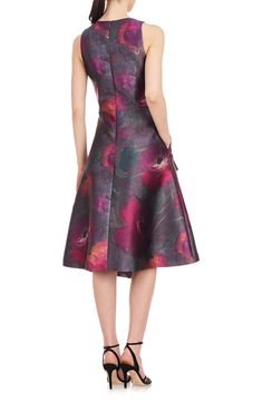 Bloom at every social occasion in this sleeveless cocktail dress accentuated with a ruffled, asymmetric skirt and perfected with a pair of pockets. 42" to 46" length (size 8) Hidden back-zip closure Surplice V-neck Sleeveless On-seam pockets Lined 100% polyester Dry clean Imported