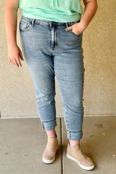 Cora is a light, vintage wash boyfriend fit jean from Judy Blue. Features a high waist and a cuff that can be rolled up or down. Rise: 10.75" Inseam: 27" plus a 4" Cuff --31" Total 92% Cotton / 7% Polyester / 1% Spandex Fit Notes: Typical Judy Blue fit -- size down one from a department store size. Medium Wash Jeans With Cuffed Ankles For Spring, Spring Jeans With Rolled Hem In Medium Wash, Spring Jeans With Cuffed Ankles In Medium Wash, High-rise Medium Wash Jeans With Rolled Hem, Boyfriend Fit Jeans, Boyfriend Jean, Blue Fits, Judy Blue Jeans, Boyfriend Fit