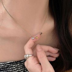 Metals Type : zinc Alloy Fine or Fashion : fashion Product Description:1.Product name: Heart Minimalist Necklace2.Product size: Necklace length:50cm(19.69in),Pendant size:8*8mm(0.31*0.31in)3.Product style: as shown in the picture4.Product color: Golden,Silvery5.Product material: AlloyFeatures:1.Unique and stylish: This heart pendant necklace for women is a trendy and distinctive accessory that embodies the cool and minimalist aesthetic of the fashion.2.Minimalist design: The simple and understat Heart-shaped Alloy Necklaces For Mother's Day, Mother's Day Heart Pendant Alloy Necklace, Heart-shaped Alloy Necklace, Metal Heart Necklace With Clavicle Chain For Mother's Day, Mother's Day Metal Heart Necklace With Clavicle Chain, Mother's Day Heart Necklace With Clavicle Chain, Alloy Heart Pendant Necklace With Clavicle Chain, Alloy Necklace With Heart Pendant And Clavicle Chain, Alloy Clavicle Chain Necklace With Heart Pendant