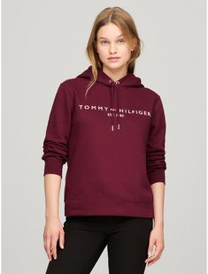 Tommy Hilfiger women's hoodie. Ideal for year-round wear, our medium-weight hoodie is made from cotton-blend fleece that feels soft against the skin. Designed with a drawstring hood and ribbed trim, this sporty pullover features our embroidered logo at the chest.  Material: 70% Regenerative Cotton, 30% Polyester Pes. Women's Hoodie, Tommy Hilfiger Women, Medium Weight, Sweater Top, Hoodies Womens, Tommy Hilfiger, Cotton Blend, Top Outfits, Trim