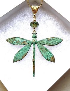 Large Gold vintage patina dragonfly pendant necklace, perfect dragonfly gift!  This dragonfly pendant is really stunning! Will definitely stand out in a crowd. Excellent gift for any dragonfly lover in your life, including yourself! The dragonfly totem carries the wisdom of transformation and adaptability in life. As spirit animal, the dragonfly is connected to the symbolism of change and light. When the dragonfly shows up in your life, it may remind you to bring a bit more lightness and joy int Elegant Green Dragonfly Shaped Jewelry, Green Dragonfly Jewelry For Gifts, Green Dragonfly Jewelry As A Gift, Green Dragonfly Jewelry Gift, Elegant Patina Necklaces As Gift, Elegant Patina Necklaces For Gifts, Handmade Green Dragonfly Jewelry, Bohemian Dragonfly Jewelry For Gifts, Bohemian Dragonfly Jewelry For Gift