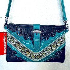 Nwt Montana West Turquoise Blue And Cognac Brown Multi Tone Western Rustic Crossbody Handbag Purse With Silver Stud Embellishments. Adjustable Length Shoulder Strap And Multiple Compartments. Magnetic Snap Front Closure. Tags: Country Western Rodeo Bohemian Southwestern Cowboy Cowgirl Faux Leather Turquoise Crossbody Bag With Adjustable Strap, Turquoise Crossbody Bag With Detachable Strap, Turquoise Crossbody Shoulder Bag With Removable Pouch, Turquoise Crossbody Shoulder Bag With Detachable Strap, Blue Crossbody Bag With Snap Closure, Blue Shoulder Bag With Snap Closure, Western Style Purse, Montana West Purse, Montana West Handbags