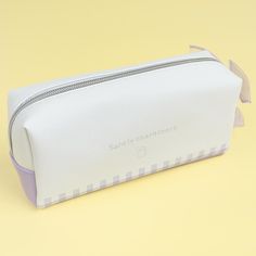 This kawaii pencil case features cute watercolor-like prints of Sanrio Characters dressed as babies! It even showcases a sheer ribbon zipper pull for added cuteness. Use this case to store your writing materials. Made from synthetic leather Kawaii White Stationery For Everyday Use, Cute White Pencil Case With Pen Holders, White Stationery With Pen Slots For Everyday Use, White Stationery With Pen Slots, Cute White Rectangular Pencil Case, White Portable Pencil Cosmetic Bag, White Rectangular Pencil Case For Everyday Use, White Portable Pencil Case For School, White Rectangular Pencil Case With Pen Holders