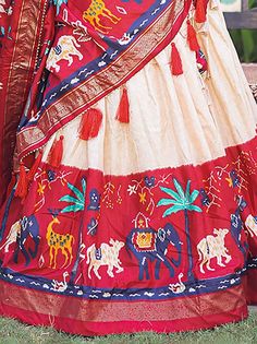 Design and pattern could be at the rise of your beauty after you dress in this marvelous red digital printed dola silk festive wear lehenga choli. This stunning set will surely brighten up your festive occasions, Navratri, receptions, weddings, and other events where you want to stand out from the crowd.
Crafted with utmost perfection, this lehenga choli set is designed to make you feel like a style icon. It features a red printed dola silk lehenga with foil work that has an impressive 4-meter f Festive Sharara With Printed Motifs, Ikat Print Saree For Wedding And Festivals, Wedding Saree With Ikat Print For Festivals, Festive Wedding Saree With Ikat Print, Festive Ikat Print Saree For Wedding, Bohemian Art Silk Lehenga For Festive Occasions, Ikat Print Art Silk Traditional Wear For Weddings, Anarkali Saree With Ikat Print For Festivals, Traditional Ikat Print Wedding Outfit