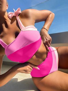 Introducing our Sarah Pink Colorblock High Waist Bikini. Show off your confidence and style this summer with our flattering and comfortable bikini. Perfect for lounging by the pool or catching some waves at the beach. Get ready to make a splash! Material: Polyester Support Type: Wire Free With Pad: Yes Pink Nylon Tankini For Poolside, Pink Nylon Tankini For Vacation, Pink Nylon Beachwear Swimwear, Pink Nylon Swimwear For Beachwear, Nylon Tankini For Water Sports In Summer, Pink Color Block Swimwear For Summer, Color Block Tankini Beachwear, Pink Nylon Summer Swimwear, Pink Color Block Swimwear For Poolside