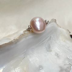 A pink pearl pinky ring on a simple silver band. * 9mm x 8mm natural pale pink freshwater pearl  * natural baroque pearl * Argentium silver band - better than sterling. See below. * U.K. size H / US size 4 (not your size? Message me) * minimalist design  This pearl has the palest pink nacre with a unique, baroque surface. The pearl will turn on the bar to reveal the banded surface of its other side.  Fitting comfortably flat on the finger on a slim, argentium silver band, this silver pearl ring Unique Pearl Jewelry, Message Design, How To Clean Earrings, Silver Pearl Ring, Ring Pearl, Bar Ring, Rose Pale, Pearl Jewellery, Etsy Bridesmaid Gifts