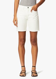 As temperatures go up, you'll want to have a stylish pair of white denim shorts on hand. The 7" Lara Bermuda Short in 'Uyuni' offers a clean slate for building warm-weather ensembles, done in 100% cotton and featuring a clean, simple five-pocket design with softly frayed hems for a casual finish. 9 1/2" rise7" inseam100% cottonmodel is wearing size 26 9 1/2" rise knee 19" leg opening 7" inseam Distressed Bermuda Shorts, Bermuda Shorts Women, White Jean Shorts, Clean Slate, Bermuda Short, White Denim Shorts, Mid Rise Shorts, Denim Cutoff Shorts, Denim Cutoffs