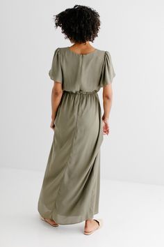 The modest formal maxi dress that you have been waiting for! The ‘Naomi’ is effortless and feminine - the perfect pick for family photos, an elegant party, or a modest bridesmaid dress. This timeless dress features a modest scoop neckline, flutter sleeves, and a chiffon overlay. The lightly gathered elastic waist and zipper closure allow for ease of styling and a flattering fit. This dress is fully lined - no layering required! Exclusively designed with you in mind. Self & Lining 100% Polyester