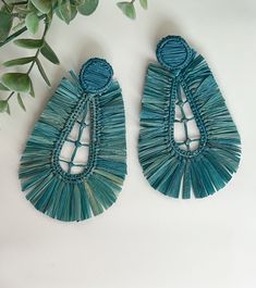 "Handmade  Blue raffia earrings.  This is an special and unique accesory handmade with love💗, for everyday, and matches with all outfits. Also  is great for special occasions as weddings, anniversary, ... The earrings are perfect for the bride and her bridesmaids.   All the  items are 100% handmade from natural fibers 🍃.Please allow for any color and sizing variations, or natural imperfections created during the hand making process. No two handmade items are alike.  I make sure that each piece made in my workshop is as good as the one shown.  📏 Size: 4.1. (10,5cm) x 2.9\" (7,5cm) approximately. 🌈Color: Blue. Ask me if you need another color. 🌎PROCESSING + SHIPPING TIMES: Your earrings will ship within 1-2 business days after  purchase if they are in stock. If we need to make them from Green Tassel Beach Earrings, Beach Green Tassel Earrings, Handmade Turquoise Tassel Earrings, Blue Tassel Beach Earrings, Turquoise Tassel Earrings For Beach, Blue Bohemian Tassel Earrings For Summer, Blue Drop Tassel Earrings For Summer, Bohemian Blue Earrings For Beach, Bohemian Blue Tassel Earrings For Summer