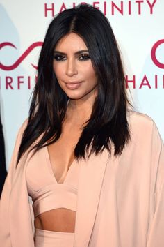 Kim Kardashian's app made over $43 million this quarter. Kim Kardashian Hair, Kardashian Hair, Jenner Style, Fashion Watch, Brown Hair With Highlights, Kardashian Style, Dark Brown Hair, Synthetic Lace Front Wigs