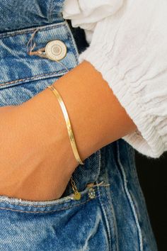 This stunning bracelet is the most perfect staple you could every wish for. It is a flat gold snake chain made out of a high quality stainless steel material that is water/tarnish resistant, making it perfect for everyday wear. It has an adjustable clasp so it'll fit your wrist perfectly. I am in love with this piece! Bow Ponytail, Gold Snake Chain, Snake Chain Bracelets, Snake Bracelet, Gold Snake, Branded Gifts, Wallet Accessories, Screw Back Earrings, Accessories Storage