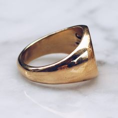 Gold toned glossy Brass Minimal Ring in sizes for both men and women. This simple ring has a circular flat face but lot's of style and flat top rings are definitely in right now! Available in 925 Sterling Silver https://etsy.me/2AZYZkU Ring Size Available in all sizes. Please be sure to find your exact ring size for the finger you want before ordering. See image chart above or you can use the chart on my website as a guide - https://jewelrylab.co/pages/ring-sizing-tips A note about brass jewelry Modern Adjustable Engraved Signet Ring, Modern Adjustable Signet Ring, Everyday Polished Signet Ring, Everyday Polished Finish Signet Ring, Minimalist Oval Wide Band Ring With Polished Finish, Gift Wide Band Ring With Polished Finish, Modern Adjustable Engraved Ring, Modern Tarnish-resistant Round Signet Ring, Modern Adjustable Engraved Metal Ring