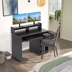 a computer desk with two monitors on it