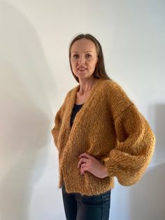 Hand knitted mohair cardigan, oversized mohair cardigan, chunky cardigan, handknitted jacket, ballon sleeve cardigan, soft, light warm cardigan  This mohair cardigan is knitted of 100% natural fibre yarn. Hand knitted, loose fit, chunky and soft mohair cardigan is a big trend! Composition of the yarn is: 70 % mohair, 30 % virgin wool. The model is 178 cm ( 5'8" ) tall and wears size M. Back lenght of size M is 60 cm.  ONLY SIZE M in color MIEL is available with a 30% discount. Size S: lenght app Hand Knitted Mohair Cardigan, Oversized Hand Knitted Mohair Cardigan, Handmade Mohair Cozy Cardigan, Oversized Knitted Mohair Cardigan, Mohair Sweaters, Pull Mohair, Nice Fashion, Cardigan Oversized, Warm Cardigan