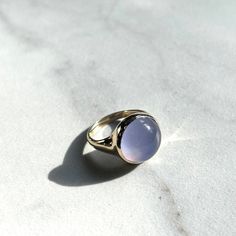 Coming soon: our best selling Lacuna Ring is getting an upgrade. Everyone’s fave will soon be available in gold , just in time for the holidays. Decided to try an extra special version set with ethereal blue chalcedony in 10k. She’s a dream. ✨✨✨ Ethereal Blue, Holidays, Ring, Blue