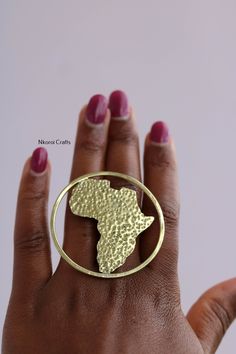 African map brass ring, African Brass jewelry, Metal rings, Handmade rings, Unisex rings, Adjustable rings, Gift for her, Christmas gift The ring is made using brass. 3-5 Days delivery via DHL Express! *Pay shipping fee for first item and additional items ship for FREE* *Care instructions* Brass tarnishes with time due to oxidation. To clean kindly wipe it with lemon juice and a cloth. To view more brass items, kindly click here: https://www.etsy.com/shop/NkoroiCrafts?ref=simple-shop-header-name&listing_id=1318305483&section_id=39639351 Thank you for visiting! Gold Brass Rings As Gifts, Nickel-free Metal Midi Rings As Gift, Nickel-free Metal Midi Rings For Gifts, Gold Copper Promise Ring, Handmade Bronze Metal Ring, Unique Bronze Rings For Gift, Handmade Silver Midi Rings In Brass, Unique Bronze Rings For Gifts, Gold Brass Midi Rings As Gift