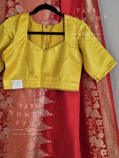 Blouse stitched - Yes Blouse Opening - Back Sleeves Length - Elbow Padded - No Blouse size 38 with inner margins extends to 44 for blouse size 36 alteration can be done on request Fall/pico - Yes done Formal Blouse With Cutdana In Traditional Drape, Yellow Art Silk Blouse With Zari Weaving, Yellow Blouse With Traditional Drape, Yellow Anarkali Blouse With Zari Weaving, Yellow Blouse With Zari Weaving For Navratri, Yellow Self Design Blouse For Puja, Transitional Yellow Blouse With Traditional Drape, Festive Yellow Blouse With Zari Weaving, Silk Blouse With Zari Weaving Long Sleeve