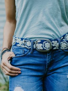 This belt is truly a work of wearable art, produced over many hours with intricate hand embroidery. Deep rich blue is accented with an energetic floral pattern in creamy ivory.Fits most standard belt loops so you can wear with your favorite jeans, or try layering it over a sweater dress to change up the look! 100% wool Boho Style Accessories, Indigenous Women, Embroidered Belt, Simple Leather, Indian Fabric, Hand Tooled Leather, Ethical Clothing, Employment Opportunities, Style Accessories