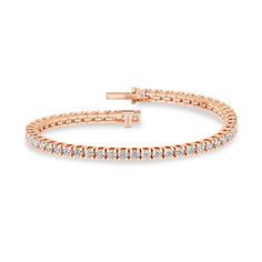 The Essential Tennis Bracelet exemplifies the magnificence of your beauty. Its string of glistening diamonds radiates luxury from every angle, and its minimalistic design makes you shine in all your glory. The diamond bracelet has a secured top GB lock that ensures the bracelet is secured and feels comfortable. Timeless Rose Gold Tennis Bracelet With Diamond Accents, Everyday Luxury Flexible Diamond Bracelet, Timeless Rose Gold Diamond Bracelet With Prong Setting, Timeless Rose Gold Round Tennis Bracelet, Rose Gold Diamond Tennis Bracelet With Jubilee Style, Rose Gold Diamond Tennis Bracelet With Prong Setting, Rose Gold Everyday Luxury Tennis Bracelet, Rose Gold Diamond Bracelet With Round Cut, Classic Flexible Tennis Bracelet With Round Cut