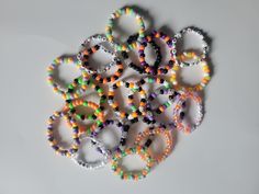 Get into the Halloween spirit with our unique and fun kandi bracelets! Perfect for trick-or-treating, Halloween parties, or just celebrating the season in style. Order yours today and embrace the spooky and the sweet! Halloween Novelty Multicolor Beaded Bracelets, Novelty Multicolor Beaded Bracelets For Halloween, Handmade Multicolor Bracelets For Halloween, Multicolor Novelty Bracelets For Halloween, Fun Multicolor Halloween Jewelry, Halloween Kandi, Bracelet Inspiration, Kandi Bracelets, Trick Or Treating