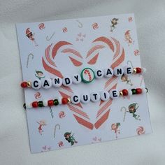 two bracelets that say candy cane cuties